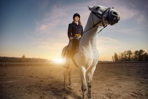Woman riding a horse